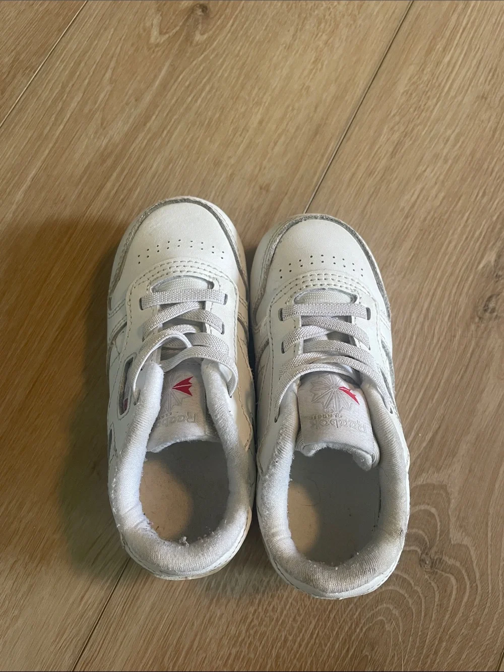 Reebok Kids Leather Sneakers in White with Red Accent